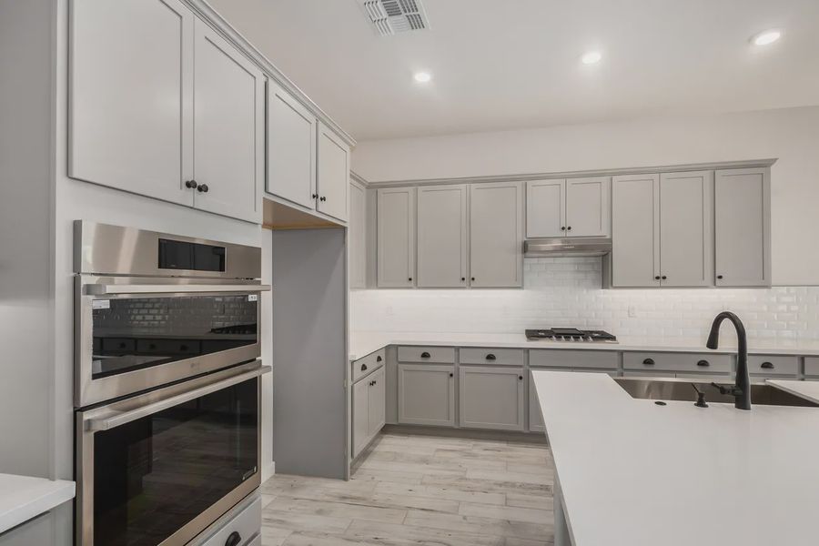 Furnished interior view inside a new home in Valencia at Granite Vista, Waddell (Image 7).