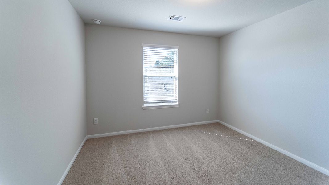 Spacious, unfurnished interior of a new home in The Canopies, Splendora (Image 29).
