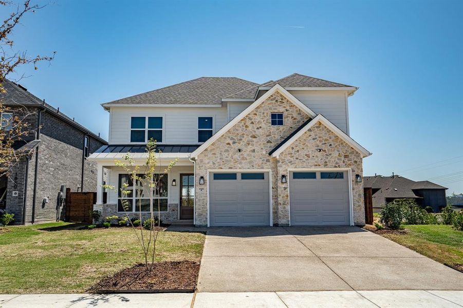 Front exterior of a new home in Solterra, Mesquite, TX, highlighting curb appeal (Image 22). Front exterior of a new home in Solterra, Mesquite, TX, highlighting curb appeal (Image 22).
