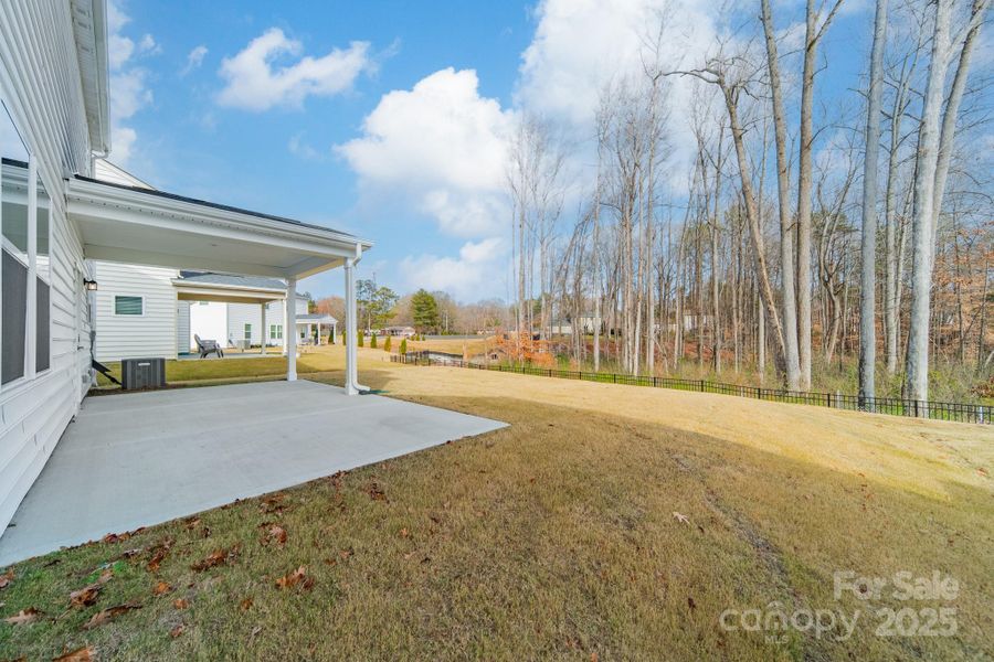 Exterior details and patio area of a home in Stewarts Landing, Charlotte (Image 24).
