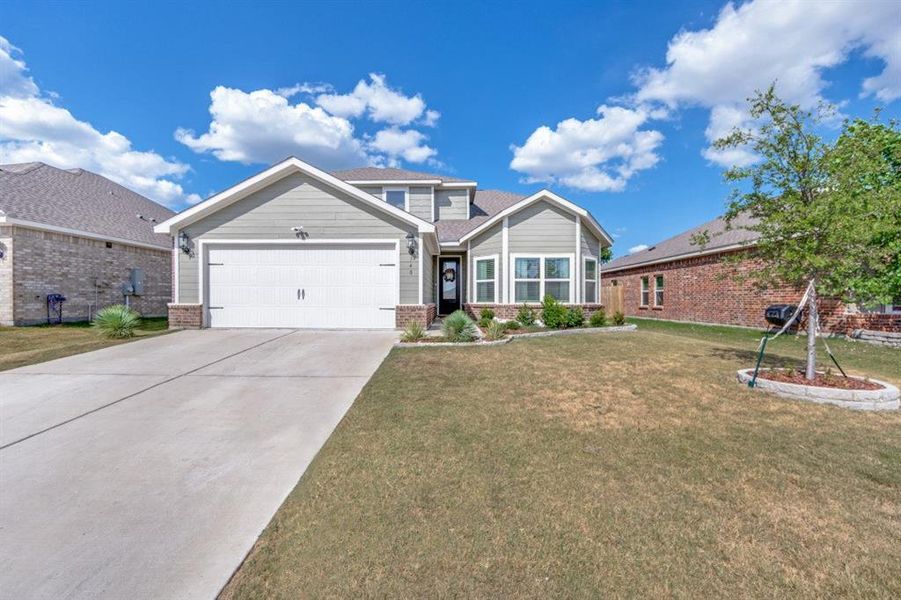 Front exterior of a new home in Southaven, Hutchins, TX, highlighting curb appeal (Image 1). Front exterior of a new home in Southaven, Hutchins, TX, highlighting curb appeal (Image 1).