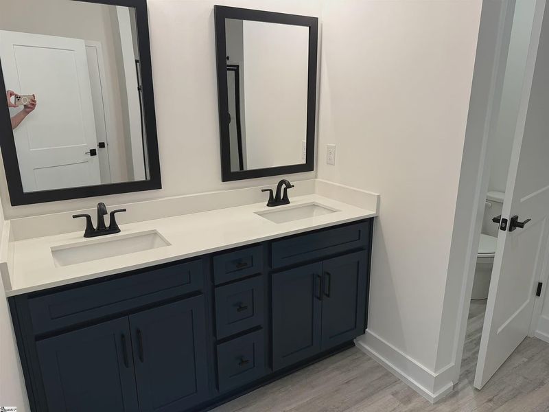 Furnished interior view inside a new home in Hidden Lake Estates, Greenville (Image 8).
