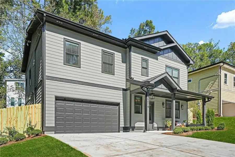 Front exterior of a new home in , Scottdale, GA, highlighting curb appeal (Image 29).