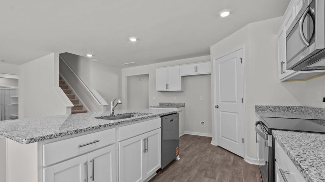 Furnished interior view inside a new home in Blair Ridge, La Grange (Image 7).