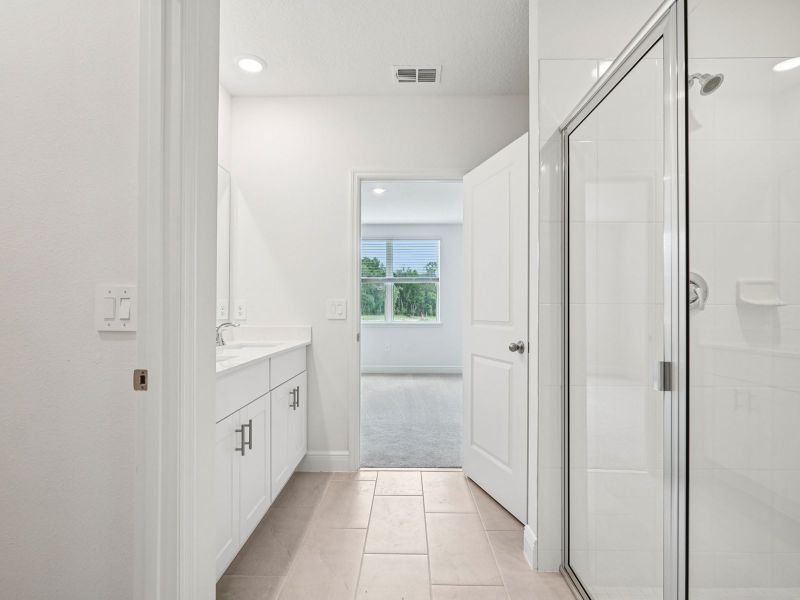 Furnished interior view inside a new home in The Reserve at Hammock Oaks - Signature Series, Lady Lake (Image 8).