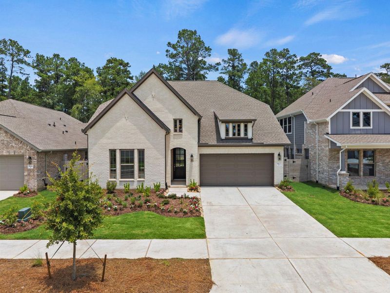 Front exterior of a new home in Two Step Farm, Montgomery, TX, highlighting curb appeal (Image 21).
