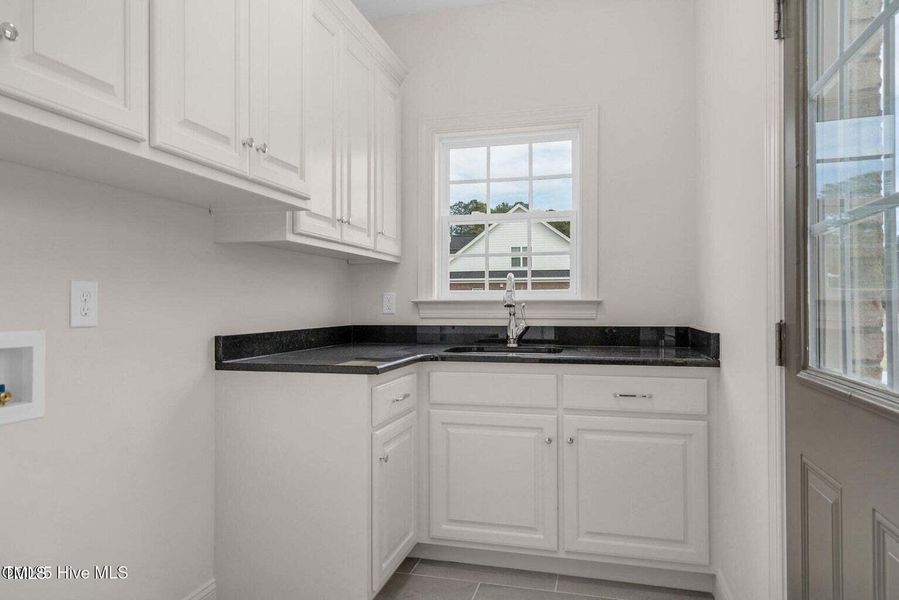 Large laundry has sink