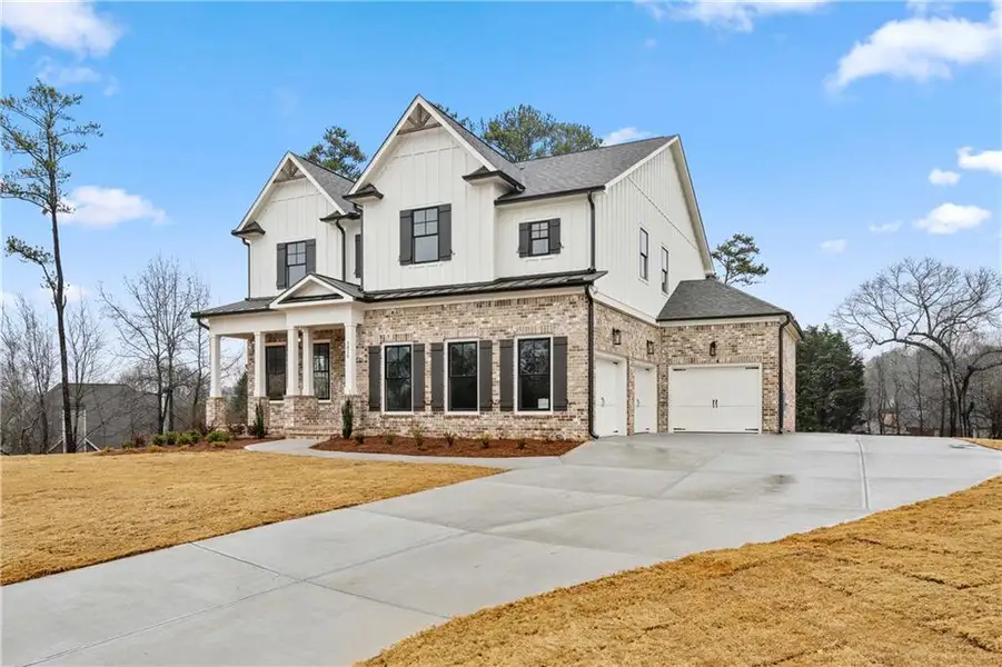 Front exterior of a new home in , Marietta, GA, highlighting curb appeal (Image 2).