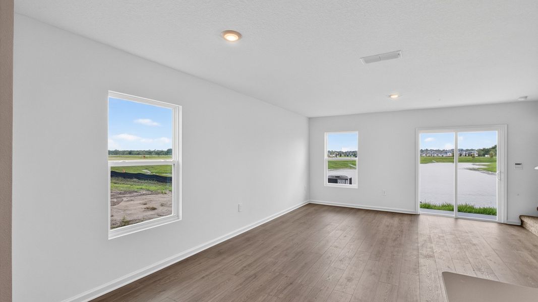 Representative unfurnished interior of a home built from the Weston by D.R. Horton in Bridle Creek Townhomes, Jacksonville (Image 13).