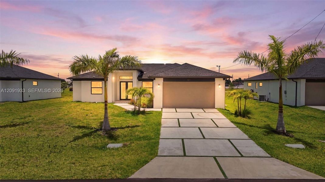 Front exterior of a new home in , Cape Coral, FL, highlighting curb appeal (Image 19). Front exterior of a new home in , Cape Coral, FL, highlighting curb appeal (Image 19).