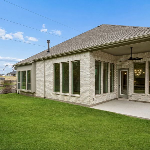 Exterior details and patio area of a home in The Parks at Wilson Creek, Celina (Image 28). Exterior details and patio area of a home in The Parks at Wilson Creek, Celina (Image 28).