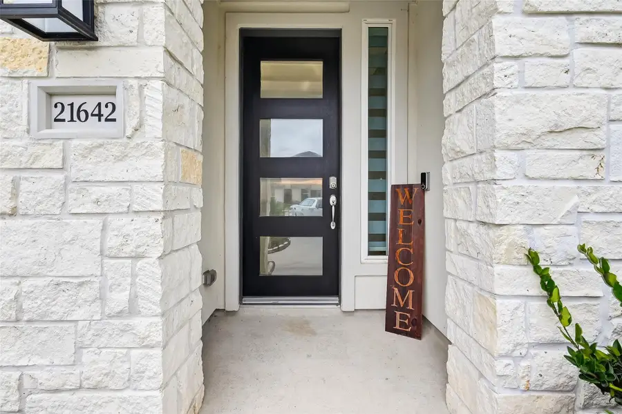 Exterior details and patio area of a home in Avalon at Cypress, Cypress (Image 3).