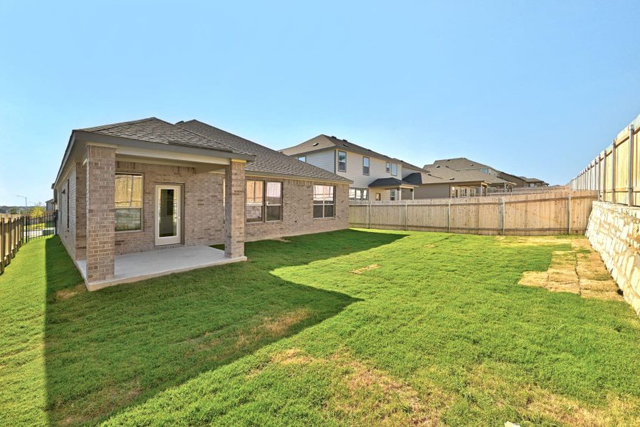 Exterior details and patio area of a home in McKinney Crossing, Austin (Image 2). Exterior details and patio area of a home in McKinney Crossing, Austin (Image 2).