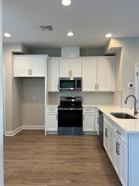 Furnished interior view inside a new home in The Towns At Long Bayou, Seminole (Image 4).