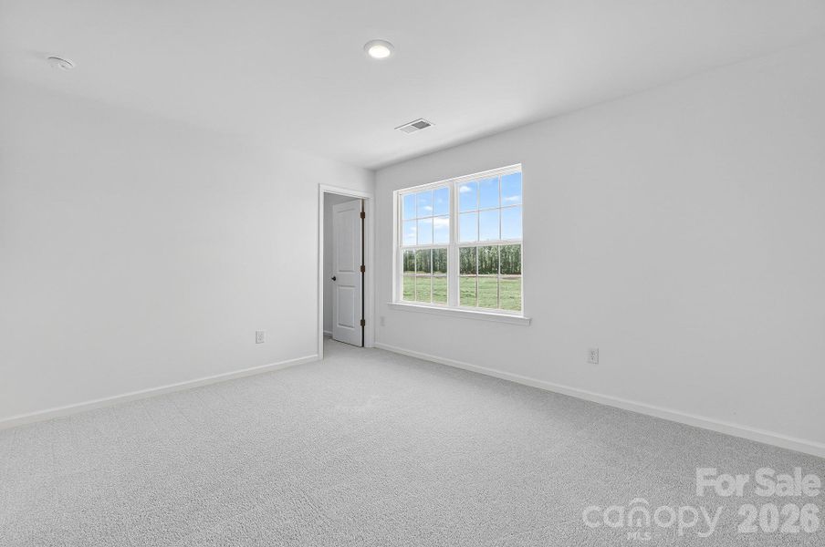 Spacious, unfurnished interior of a new home in The Vines, Charlotte (Image 11).