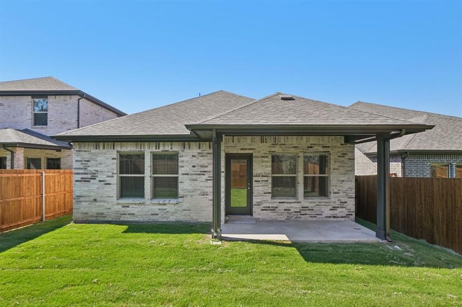 Exterior details and patio area of a home in Eastridge - Spring Series, McKinney (Image 22). Exterior details and patio area of a home in Eastridge - Spring Series, McKinney (Image 22).