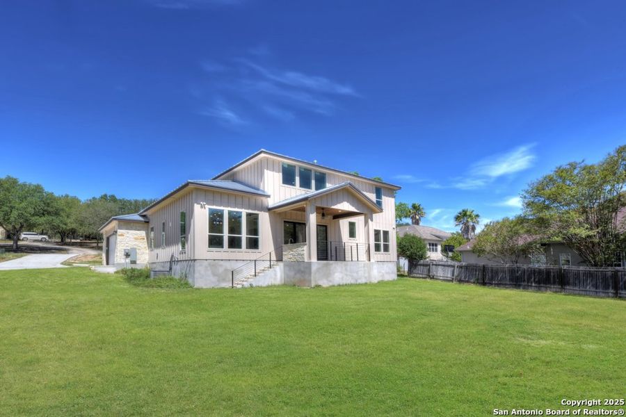 Front exterior of a new home in , Castroville, TX, highlighting curb appeal (Image 19). Front exterior of a new home in , Castroville, TX, highlighting curb appeal (Image 19).