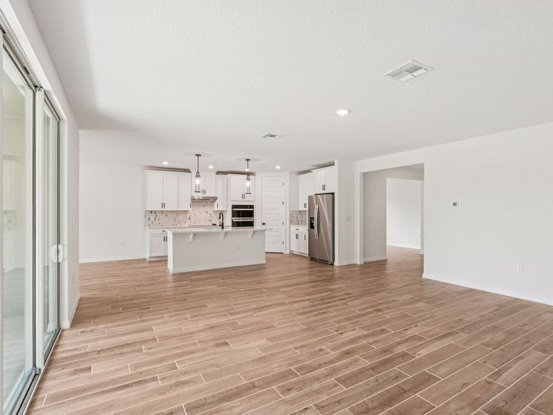 Spacious, unfurnished interior of a new home in Oakfield Trails - Signature Series, Parrish (Image 6).