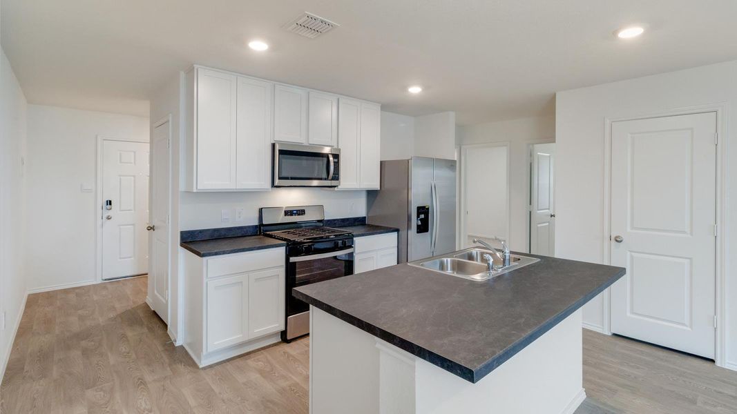 Furnished interior view inside a new home in Wayside, Uhland (Image 6).