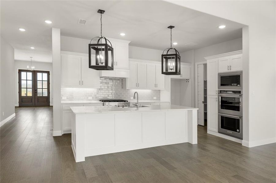 Furnished interior view inside a new home in Painted Tree Showcase, McKinney (Image 8).