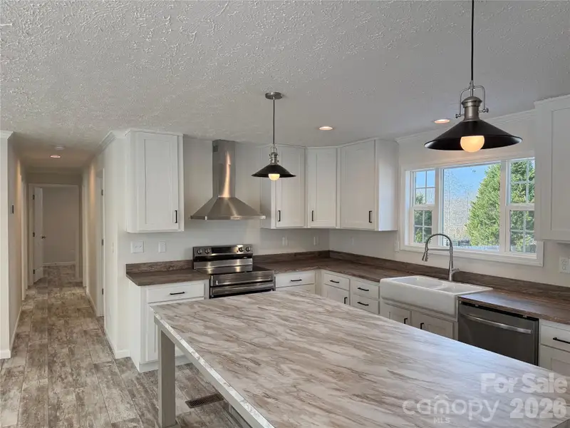 Furnished interior view inside a new home in , Statesville (Image 5).