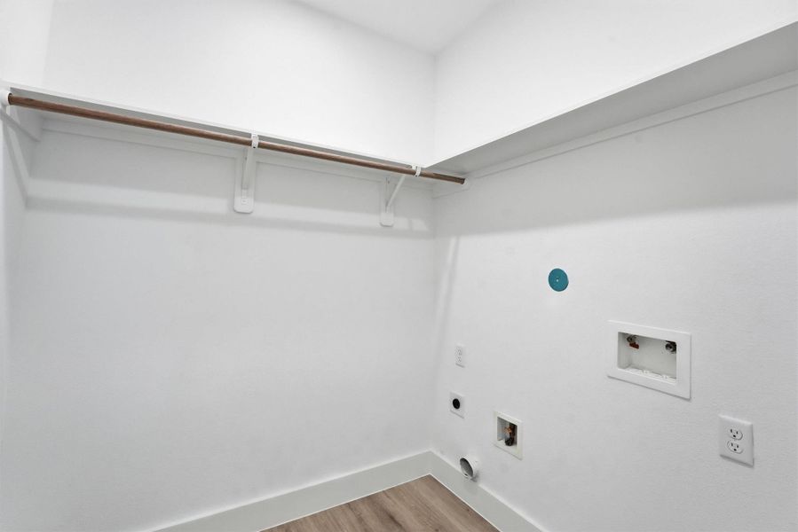 Large laundry room on same level as primary suite.