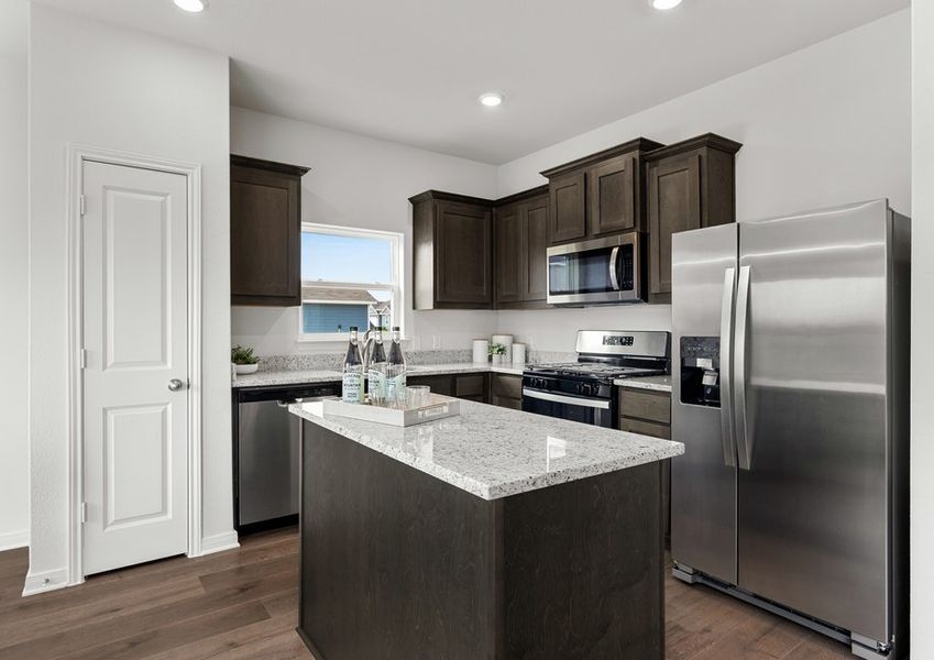 The kitchen has sprawling granite countertops. The kitchen has sprawling granite countertops.