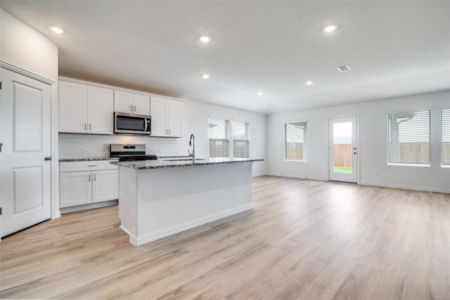 Furnished interior view inside a new home in River Ridge, Crandall (Image 4).