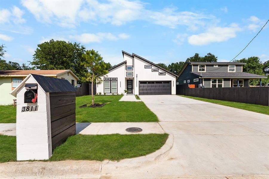 Front exterior of a new home in , Dallas, TX, highlighting curb appeal (Image 25).