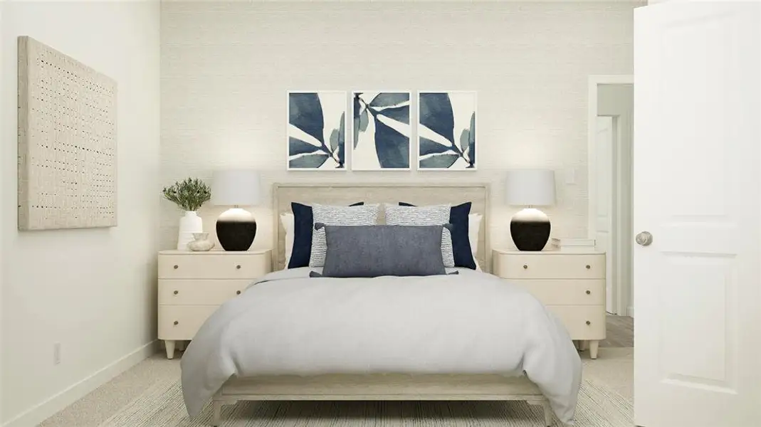 Bedroom featuring baseboards and light colored carpet Bedroom featuring baseboards and light colored carpet