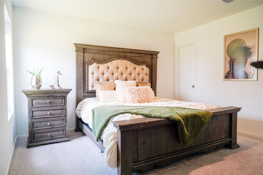 Furnished interior view inside a new home in Sunterra, Katy (Image 7).