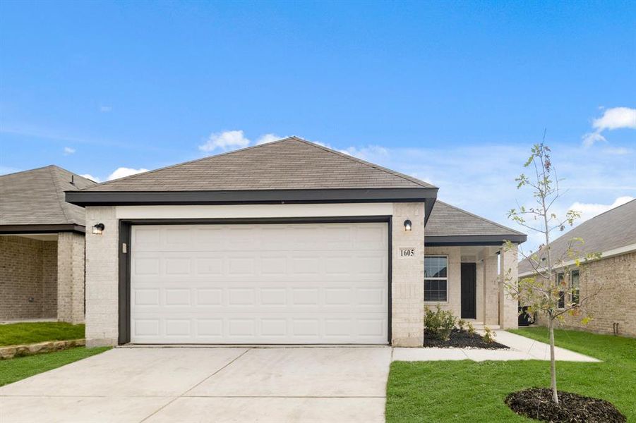 Front exterior of a new home in Christian Meadows, Ennis, TX, highlighting curb appeal (Image 1). Front exterior of a new home in Christian Meadows, Ennis, TX, highlighting curb appeal (Image 1).