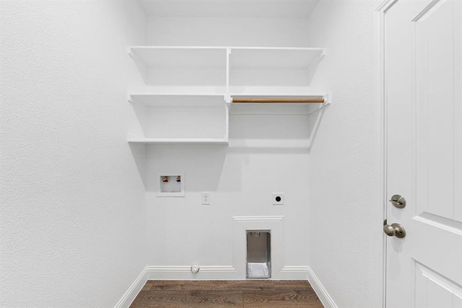 Laundry area with laundry area, washer hookup, baseboards, dark wood-style floors, and electric dryer hookup