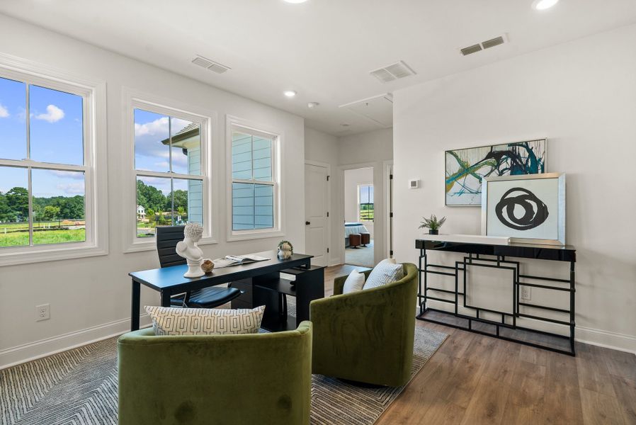 Representative furnished interior of a home built from the The Kenton by The Providence Group in Promenade at Sawnee Village, Cumming (Image 36).