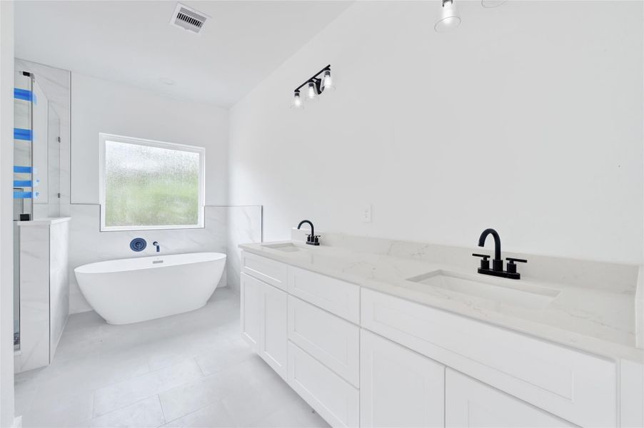 Full bath with contemporary design and quality finishes. Full bath with contemporary design and quality finishes.