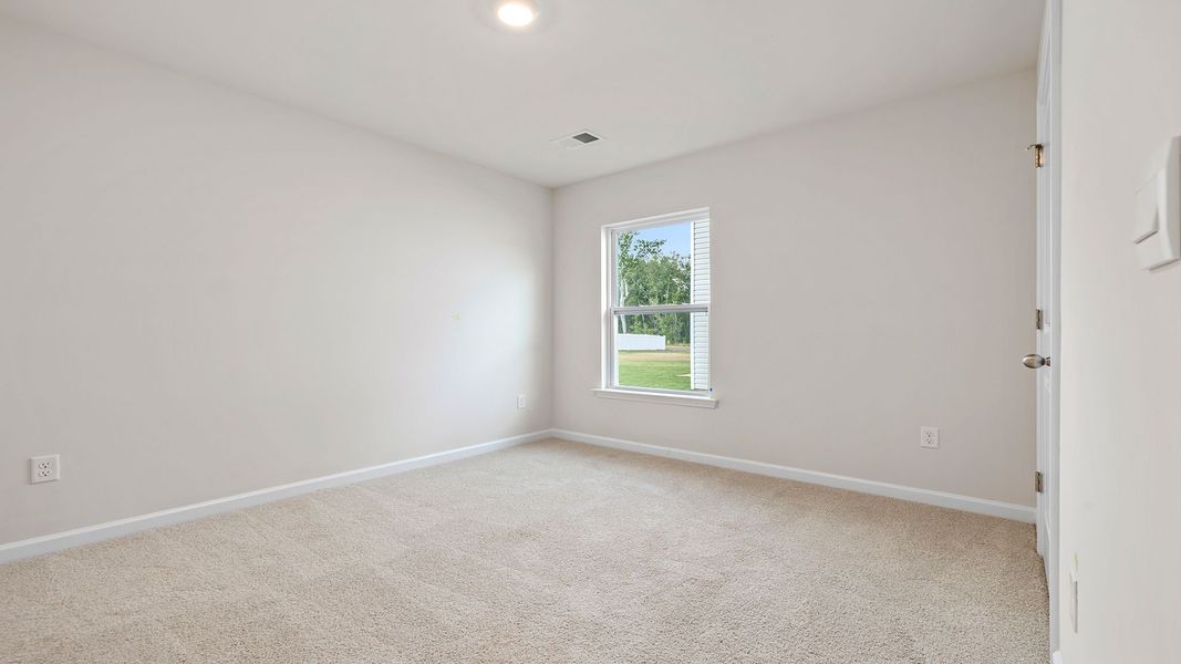 Spacious, unfurnished interior of a new home in Bentley Park, Greenwood (Image 18).