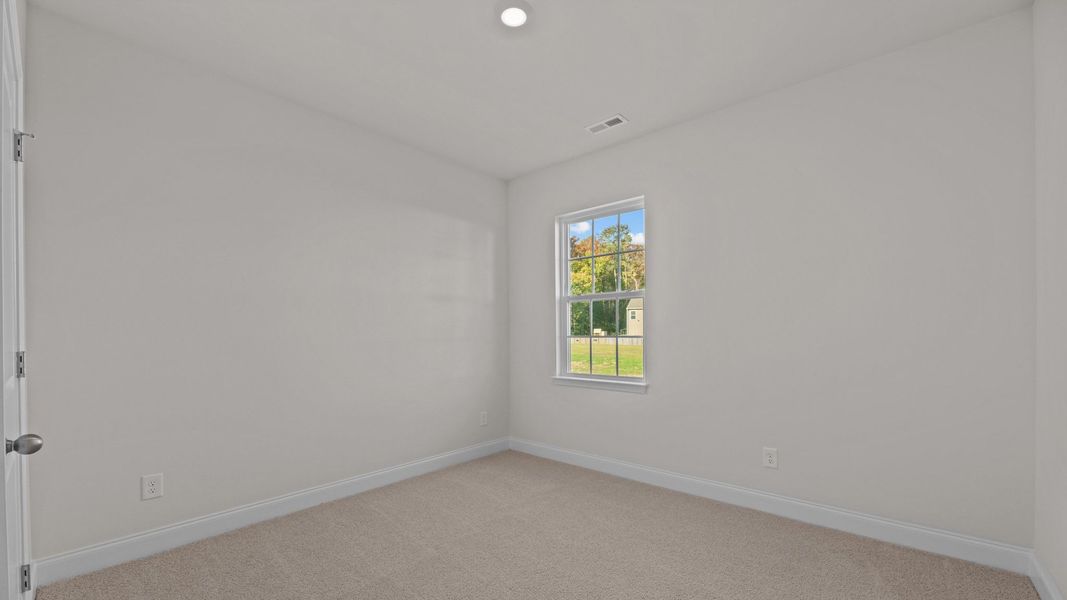 Spacious, unfurnished interior of a new home in Tyler - Home on the Lake, New Bern (Image 12).