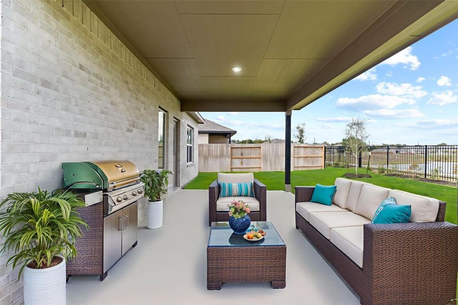 Spacious covered patio offers the perfect outdoor retreat—ideal for dining, entertaining, or simply relaxing while enjoying the tranquil lake view. *Virtually Staged Photo* Spacious covered patio offers the perfect outdoor retreat—ideal for dining, entertaining, or simply relaxing while enjoying the tranquil lake view. *Virtually Staged Photo*