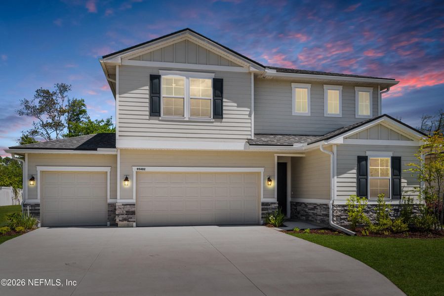 Front exterior of a new home in Woodbridge, Fernandina Beach, FL, highlighting curb appeal (Image 25).