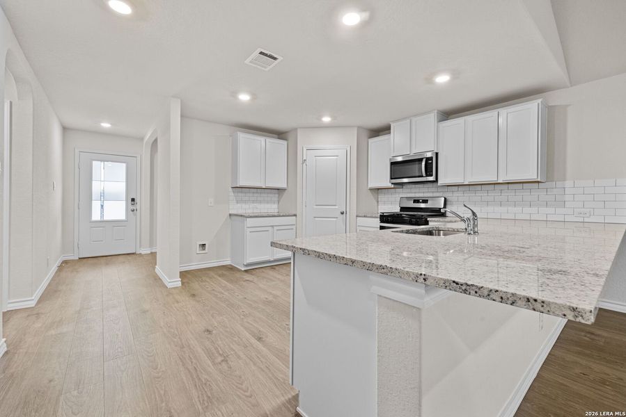 Furnished interior view inside a new home in Redbird Ranch, San Antonio (Image 6).
