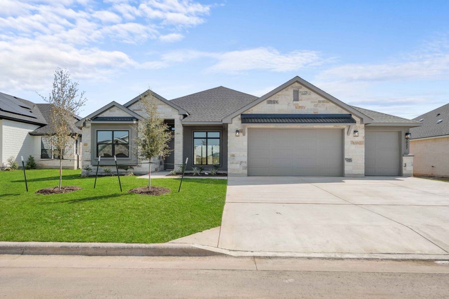 Front exterior of a new home in Bella Charca, Nolanville, TX, highlighting curb appeal (Image 1). Front exterior of a new home in Bella Charca, Nolanville, TX, highlighting curb appeal (Image 1).