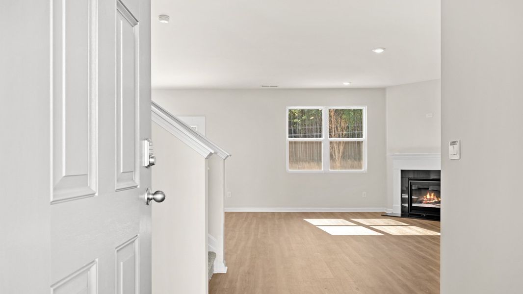 Representative unfurnished interior of a home built from the Flora by D.R. Horton in Poplar Preserve, Newnan (Image 20).