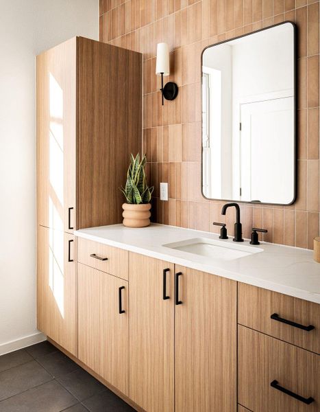 Natural light enters the bathroom. Natural light enters the bathroom.