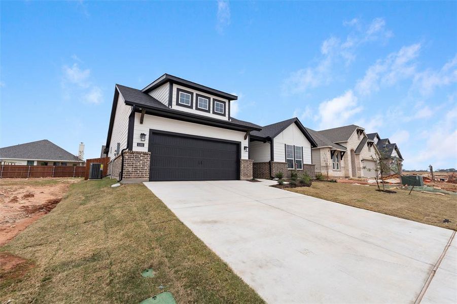 Front exterior of a new home in Covenant Park, Springtown, TX, highlighting curb appeal (Image 20).