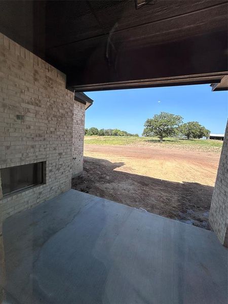 Exterior details and patio area of a home in , Poolville (Image 22).