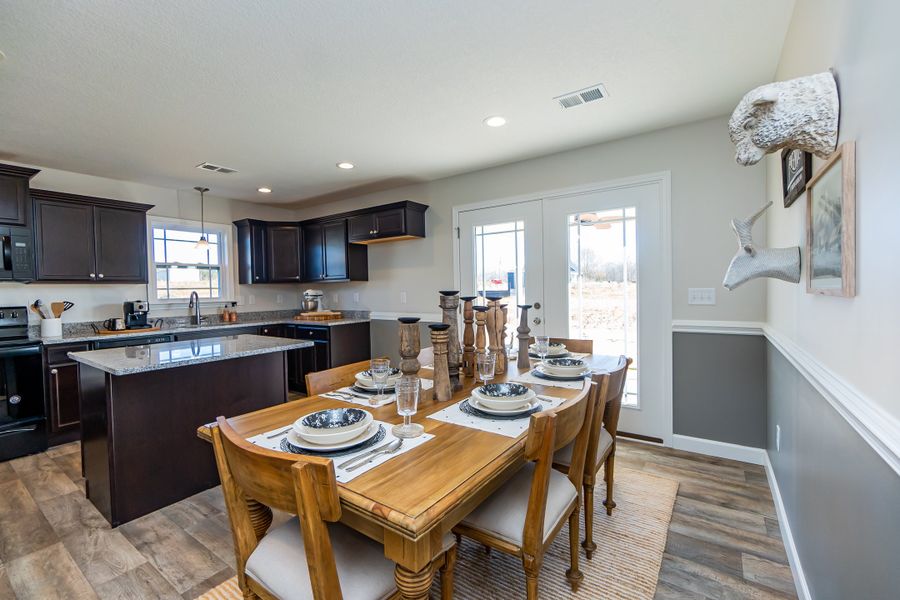 Representative furnished interior of a home built from the Clifton by Enchanted Homes in Hampshire Heights, Moore (Image 12).
