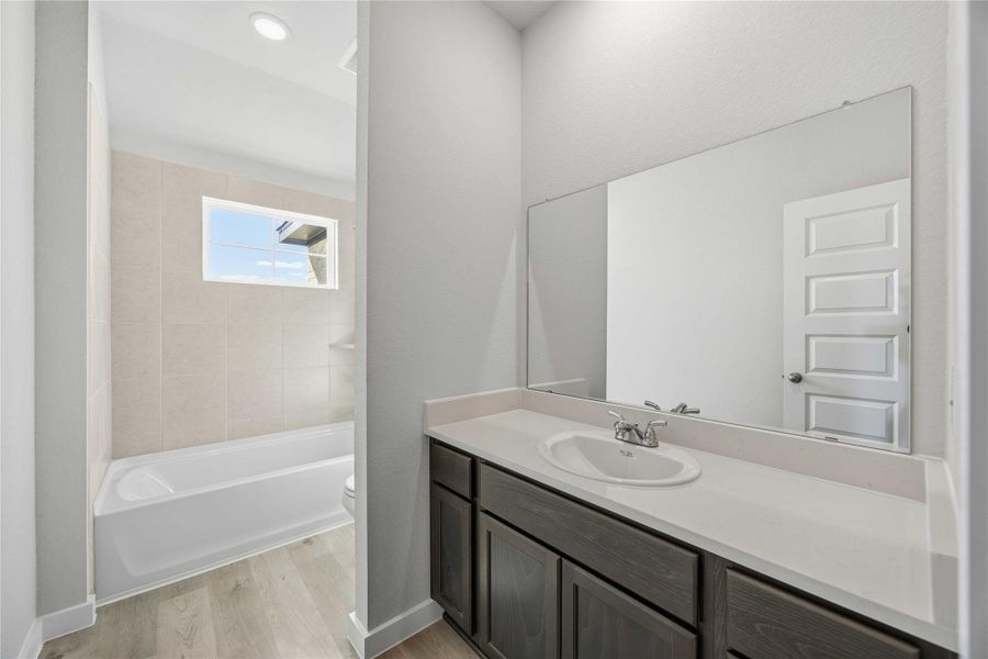 Furnished interior view inside a new home in Tejas Village, Beasley (Image 12).