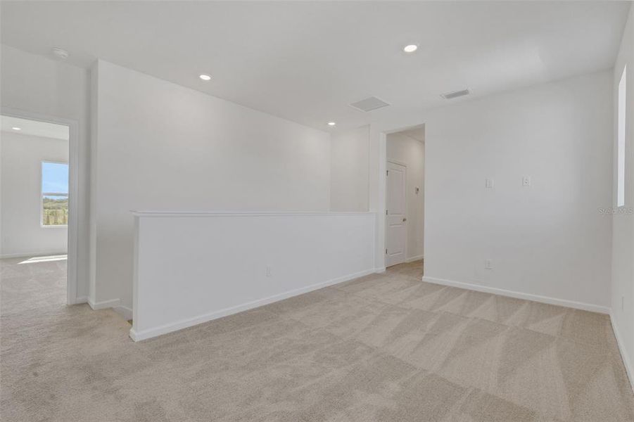 Spacious, unfurnished interior of a new home in Brystol North at Wylder, Port St. Lucie (Image 24).