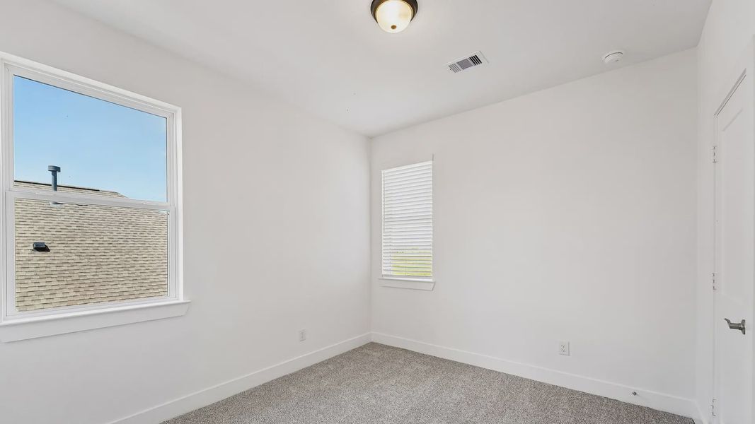 Representative unfurnished interior of a home built from the Cayman by Chesmar Homes in Crescent Bluff, Georgetown (Image 44).