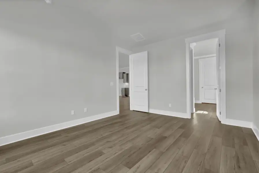 Spacious, unfurnished interior of a new home in Grand Park, Leland (Image 26). Spacious, unfurnished interior of a new home in Grand Park, Leland (Image 26).
